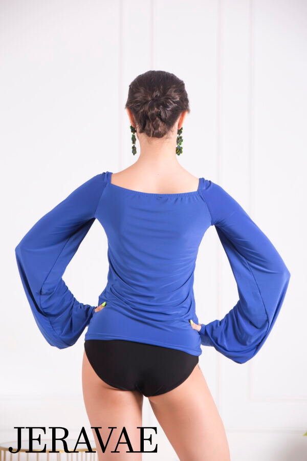 Back view of blue shirt for dance practice