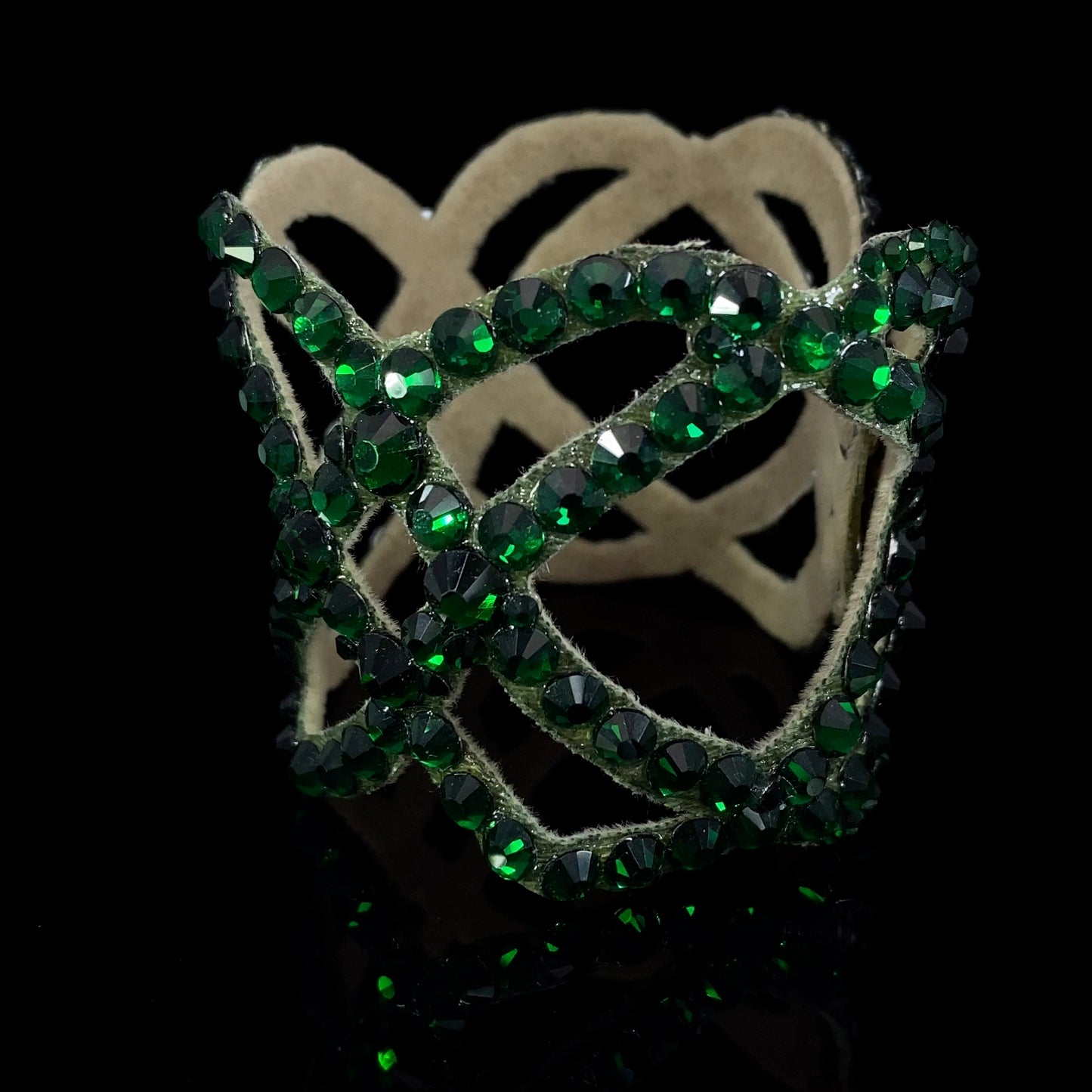 Green stones on women's dance bracelet