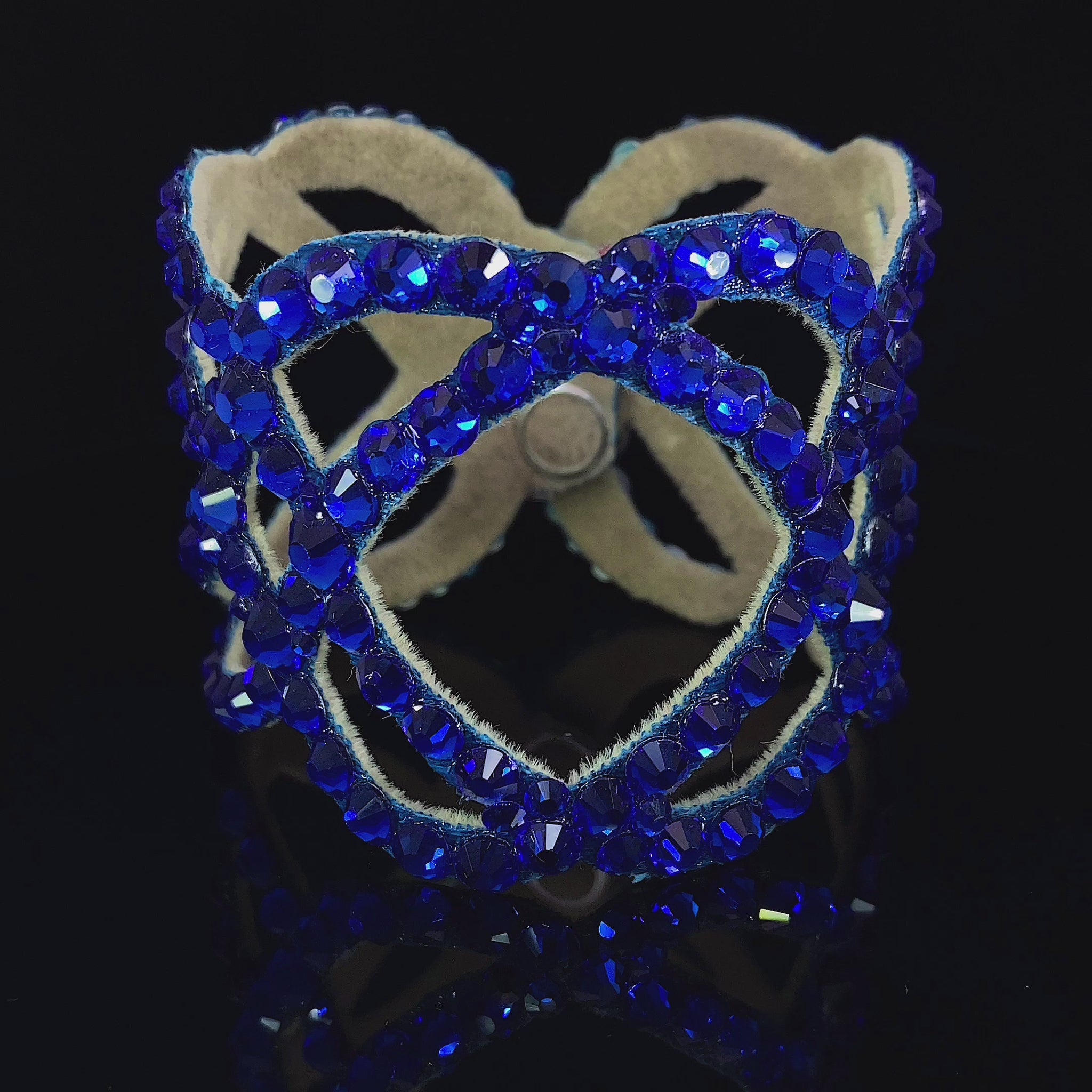 Video of deep blue rhinestones on bracelet for dancing