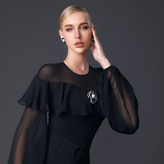 Women's Black Bodysuit Practice Top with Illusion Neckline, Large Flowy Ruffle, Mesh Lantern Sleeves, and Front Flower Detail PRA 909 in Stock