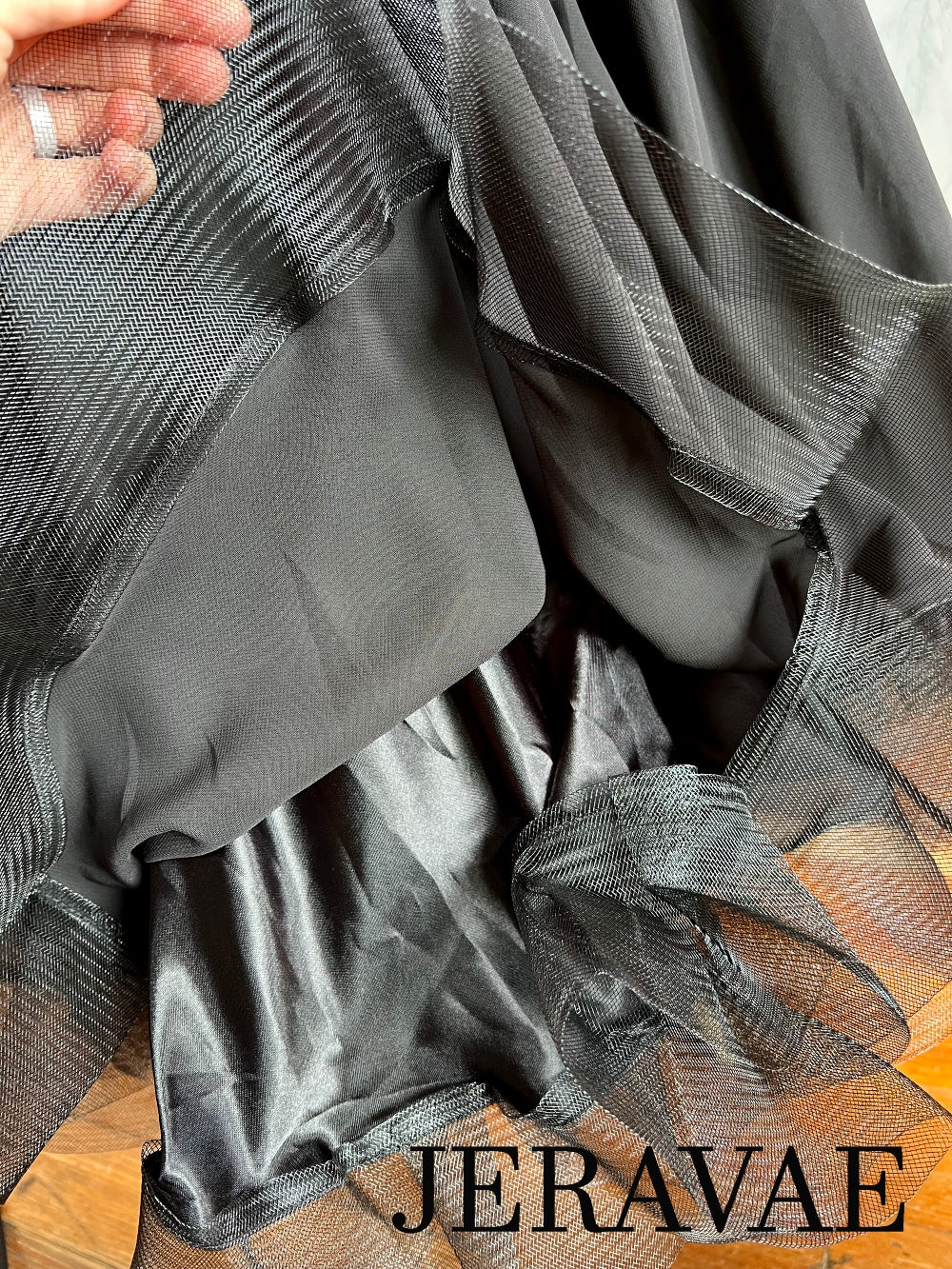 Black ballroom dress with flared crinoline skirt hem