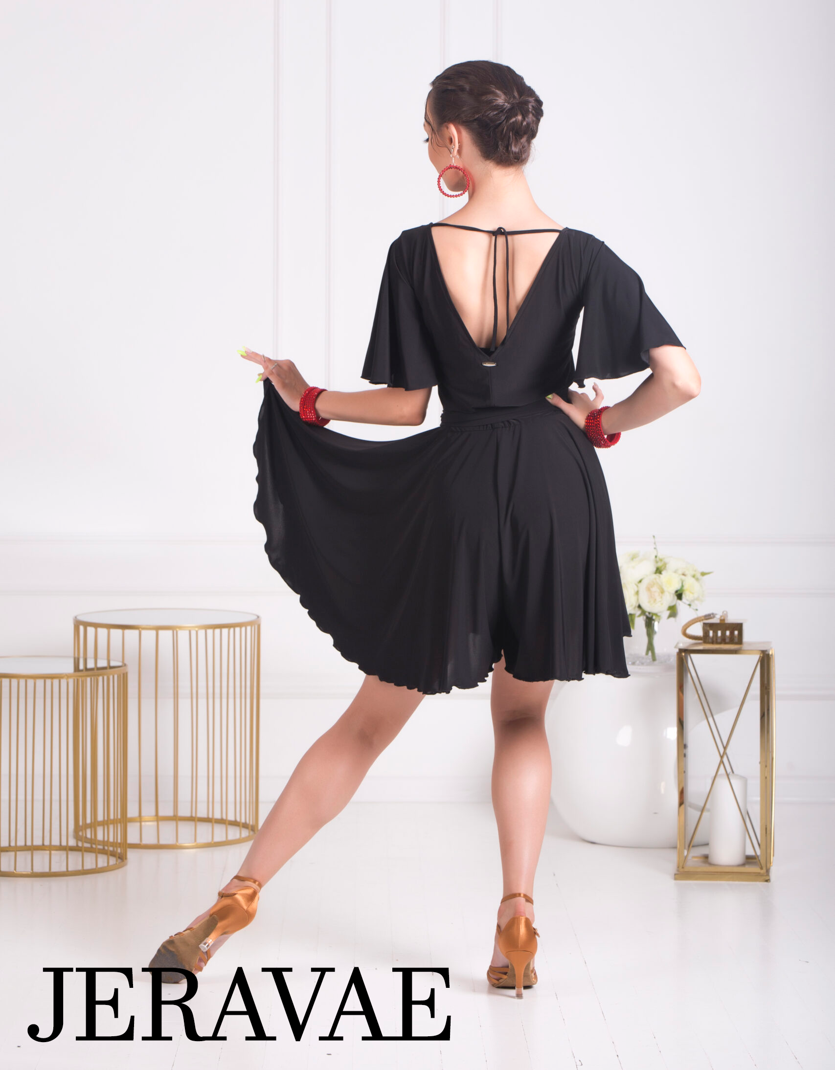 Back view of ladies' jumpsuit with shorts for ballroom and Latin dance