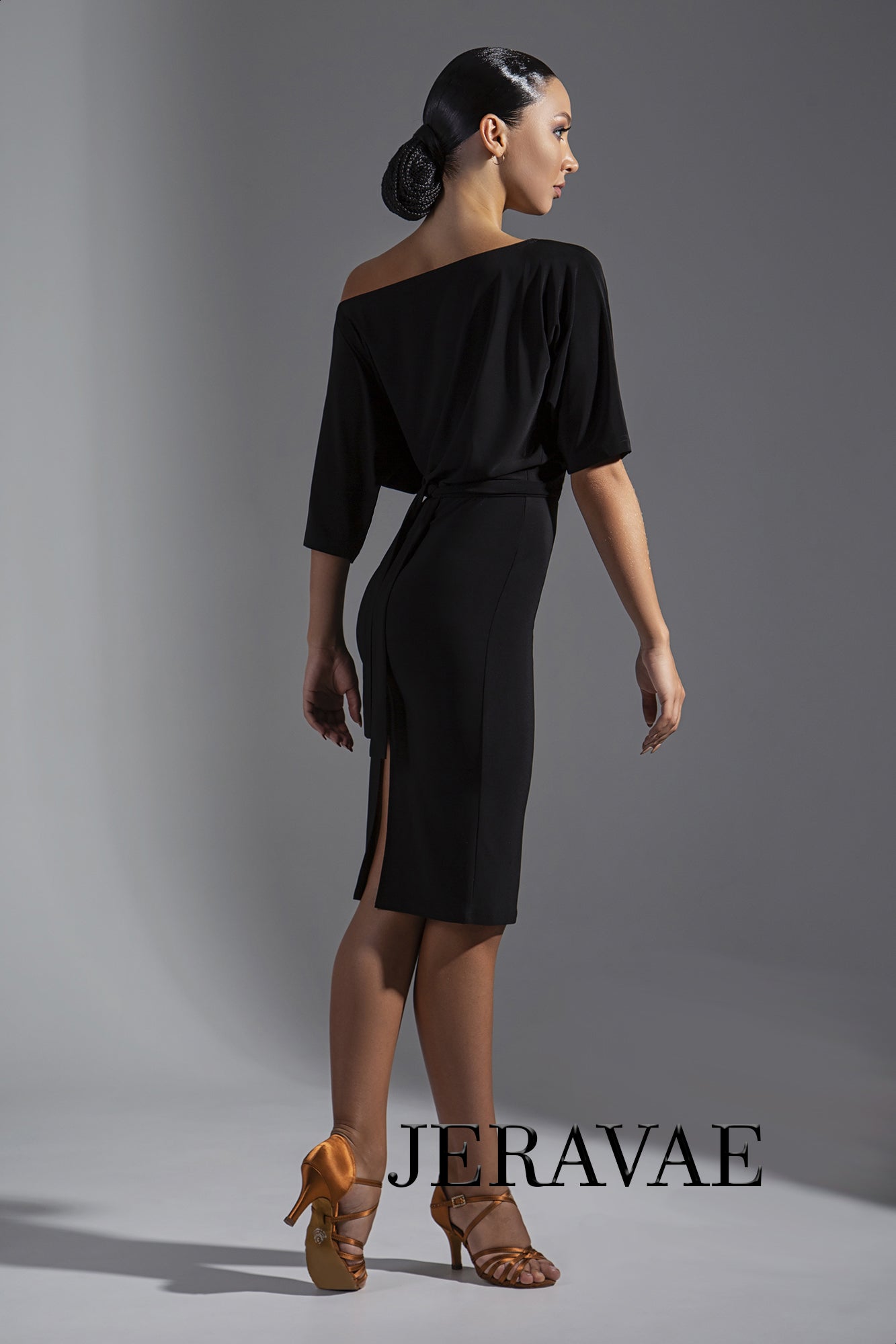 black latin dress with slit on back and a slouchy top