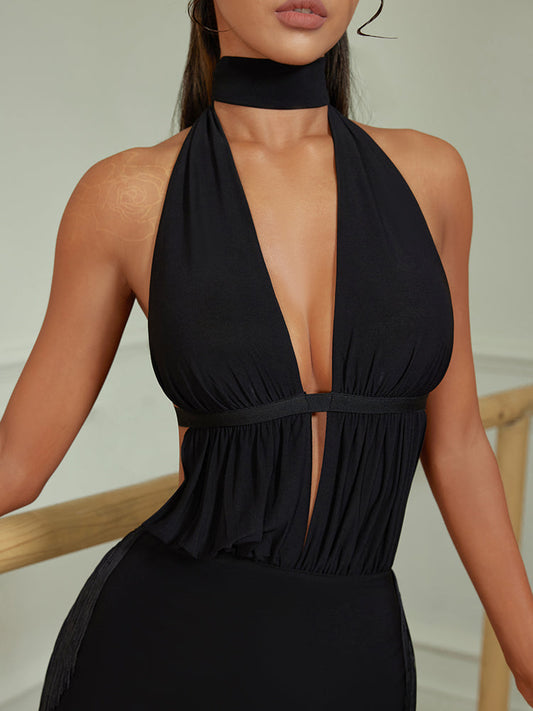 Short black Latin practice dress with pleats and deep neckline