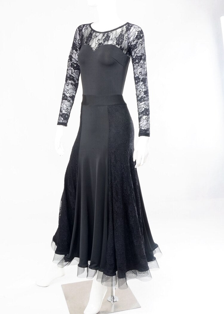 Long lace sleeves, lace section, and horsehair hem on ballroom dress