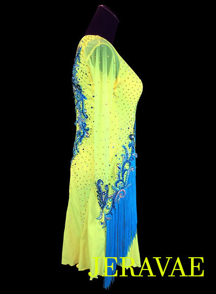Side view of ladies' Latin costume with fringe in blue and yellow