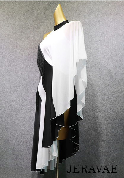 Side view of mannequin wearing black and white latin dress showing slit on left side of dress and small fringe accents along black stripes