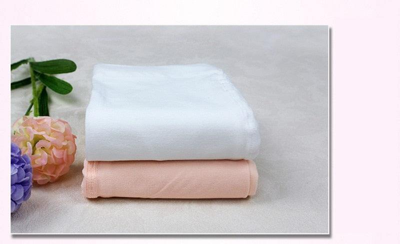 Folded Children's dance tights in white or nude pink 