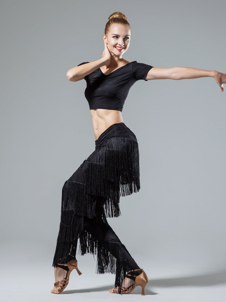 Latin pants with stirrup feet and fringe layers in black